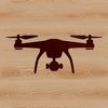 A sleek, high-flying drone in mid-air silhouette.