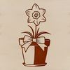 Vibrant Spring Flower in Decorative Pot A bright yellow daffodil standing upright in a decorative flower pot with green foliage.