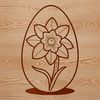 An illustrated Easter egg surrounded by spring flowers, including daffodils.