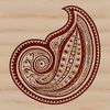A stylized ornate paisley shape used as a design element in digital projects.