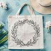 Floral Wreath Design Element A floral design element in the form of a wreath, created as a vector graphic.