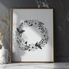 Beautiful Hand-Drawn Wreath Design A floral wreath design created using vector art, suitable for cutting machines like Cricut or laser cutters.