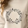 A floral wreath design made from intricately drawn elements.