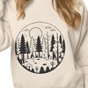Free Vector Forest Graphic A dense forest landscape with tall trees and a blurred background.