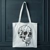 Beautiful Vector Skull Artwork A stylized illustration of a dripping skull in a gothic style, suitable for Halloween decorations or designs.
