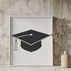 A traditional graduation cap with a tassel, symbolizing academic achievement and educational milestones.