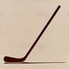 Hockey Player Preparing to Pass A hockey player holding their stick in preparation to pass the puck.