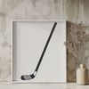 A detailed illustration of a hockey stick and puck in vector format.
