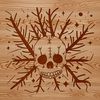 A stylized skull illustration with thorns surrounding the cranium, suitable for Halloween-themed designs.