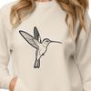 Vibrant Hummingbird in Flight Vector Design A colorful hummingbird in flight, designed as vector art for digital applications.