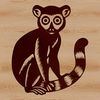 A small, furry primate with a long tail, characteristic of lemurs found in the wild.