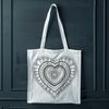 Whimsical Heart Mandalas for Digital Crafting A intricate mandala design featuring a heart shape, suitable for digital editing and cutting machine applications.