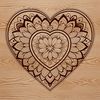 A symmetrical mandala design featuring a heart motif, created as a scalable vector graphic (SVG).