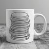 Money Stack Design Vector Illustration of a stack of coins with various denominations.