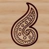 Ornate Shape Design Icon A stylized ornate shape with intricate details, typical of the paisley design motif.