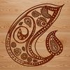 A stylized ornate shape with intricate details and curves, inspired by traditional Scottish design.