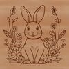 A cartoon rabbit sitting amidst a floral arrangement.