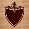 A detailed vector illustration of a shield with ornate designs.