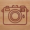 A simple line drawing of a camera, symbolizing photography and technology.