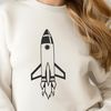 Cosmic Spacecraft SVG Design A stylized illustration of a spaceship soaring through space with a sleek, futuristic design.
