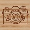 Free Digital Camera Illustration A 2D illustration of a digital camera, suitable for graphic design and print projects.