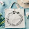 Free SVG Wreath Template for Cricut and Laser Cutters A floral wreath designed as a vector graphic, suitable for cutting machines like Cricut or laser cutters.