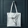 Beautiful Hummingbird in Flight Vector Art A colorful hummingbird in flight, suitable for digital designs and crafts.