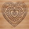 A intricately designed heart-shaped mandala created using vector art.