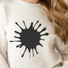 Illustration of a splat, a messy circular shape with irregular edges.