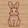 Free SVG Sitting Bunny Clip Art A sitting rabbit illustration in vector format, suitable for digital designs and crafts.
