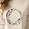 Intricate Floral Border SVG A delicate floral wreath design made from intricate lines and shapes, suitable for various digital applications.