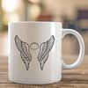 Free Halo Effect Angel Wings Vector Design A pair of delicate, feather-like angel wings with a subtle halo effect, suitable for vector design.