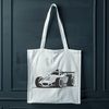 Free Racing Car Clip Art A stylized illustration of a racing vehicle, suitable for cutting machines like Cricut or laser cutters.