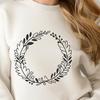 Digital Wreath Design Free Download A floral SVG design featuring a circular arrangement of flowers and foliage.
