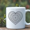 Beautiful Mandala Patterns A intricately designed heart-shaped mandala with symmetrical patterns.