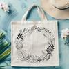 Free SVG Wreath Clip Art Image A floral SVG wreath design featuring a bouquet of colorful flowers tied with a ribbon.