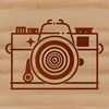 Stylized Camera Design A stylized illustration of a camera with lens and shutter.