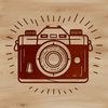 A digital camera with lens and body, designed in vector format.