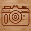 A digital camera icon with a sleek design, perfect for graphic designers and photographers looking for vector art.