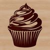A colorful cupcake made from layered cake with frosting and decorations.