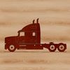 A large truck with multiple axles and a trailer, suitable for transporting heavy loads.