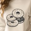 A simple illustration of a donut dessert, suitable for vector art designs.