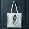 Beautiful Clip Art Feather A stylized vector illustration of a single bird's feather in various formats.