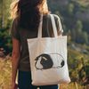 Friendly Guinea Pig Silhouette A vector illustration of a guinea pig in profile view.