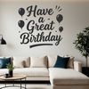 A vector graphic illustration of a happy birthday message with bold typography.