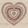 A vector illustration of a stylized love heart surrounded by ornate, swirling patterns in a mandala style.