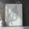 A stylized illustration of a single green leaf with smooth edges and detailed veins.