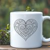 Free Love-Themed Clip Art Vector Vector mandala design featuring a heart motif, suitable for cutting machines or digital editing.