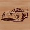 A sleek, high-performance racing car speeding down a track.