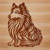 A sitting Shetland sheepdog with ornate details.
